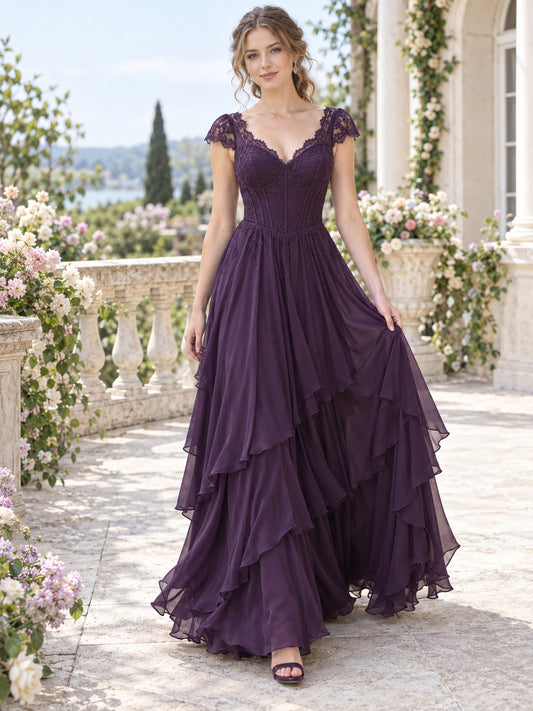 Vestido de dama de honor de gasa y encaje en morado uva, línea A, escote en V, manga corta y bajo asimétrico