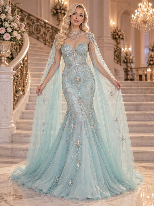 Vestido de graduación de tul y malla en azul piscina, corte sirena, cuello alto y escote corazón, manga larga y largo hasta el suelo