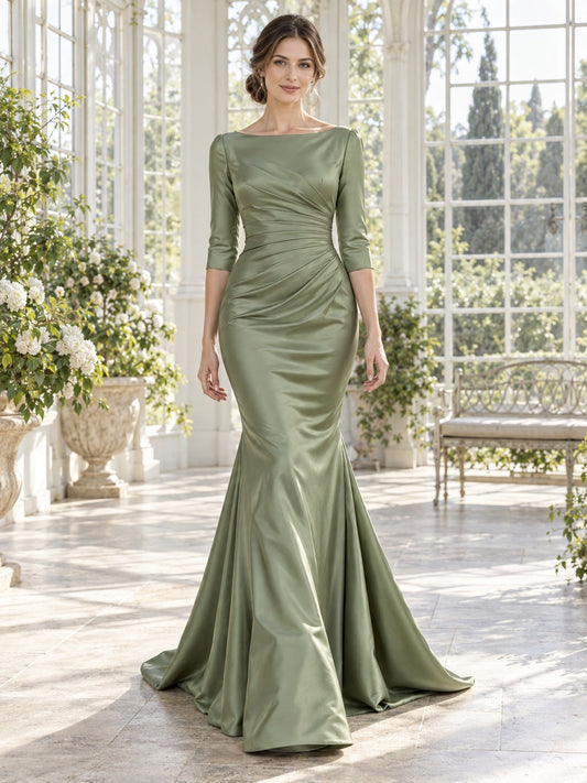 Vestido de graduación de satén en verde salvia, corte sirena, escote barco, manga tres cuartos y largo hasta el suelo