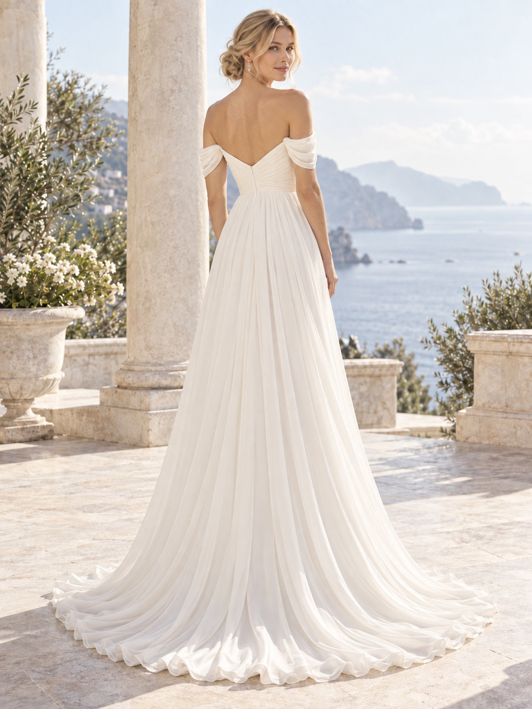 Vestido de novia de gasa en marfil, corte imperio, hombros descubiertos y escote corazón y largo hasta el suelo