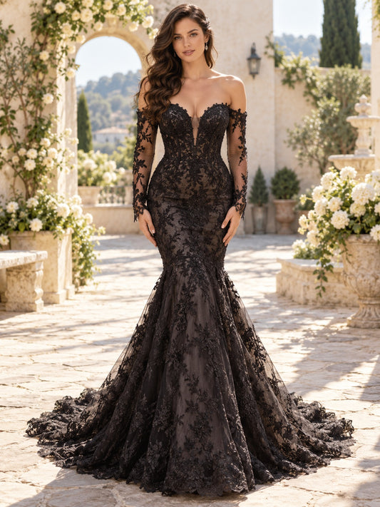 Vestido de novia de encaje y tul en negro, corte sirena, hombros descubiertos y escote corazón, manga larga y cola corta
