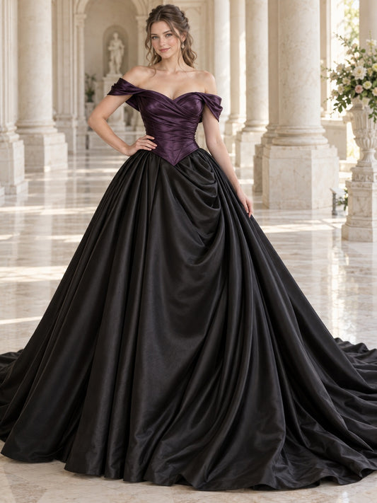 Vestido de novia de satén en negro, corte princesa, hombros descubiertos y escote corazón y cola corta