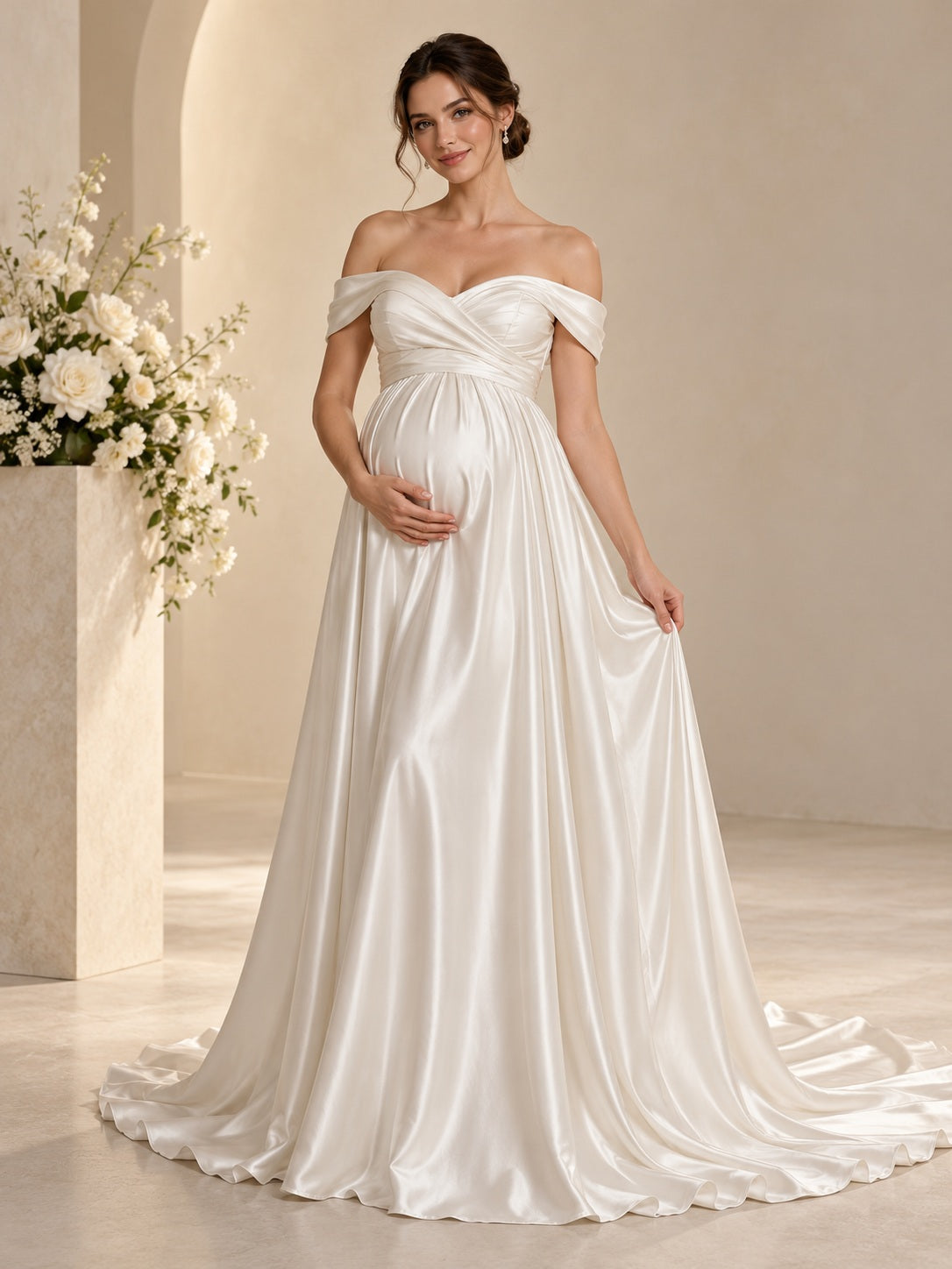 Vestido de novia premamá de satén en marfil, corte imperio, hombros descubiertos y escote corazón, manga corta y cola corta